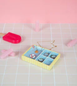 Repose-bijoux piscine